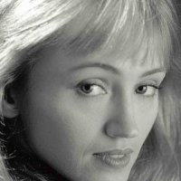 Лариса Лежнина