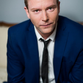Адам Лолачер
